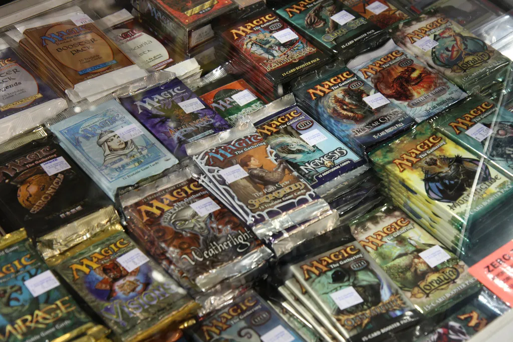 Unopened packs of Magic cards over the ages / Photo by Nathan Rupert